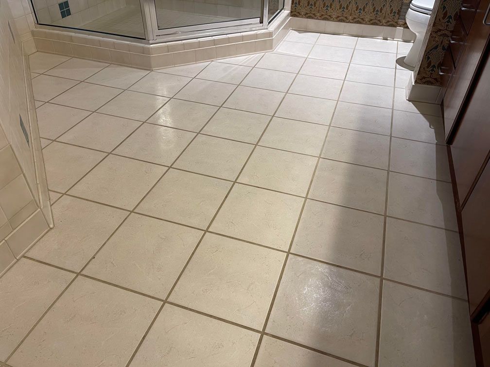 Dirty tile and grout before cleaning