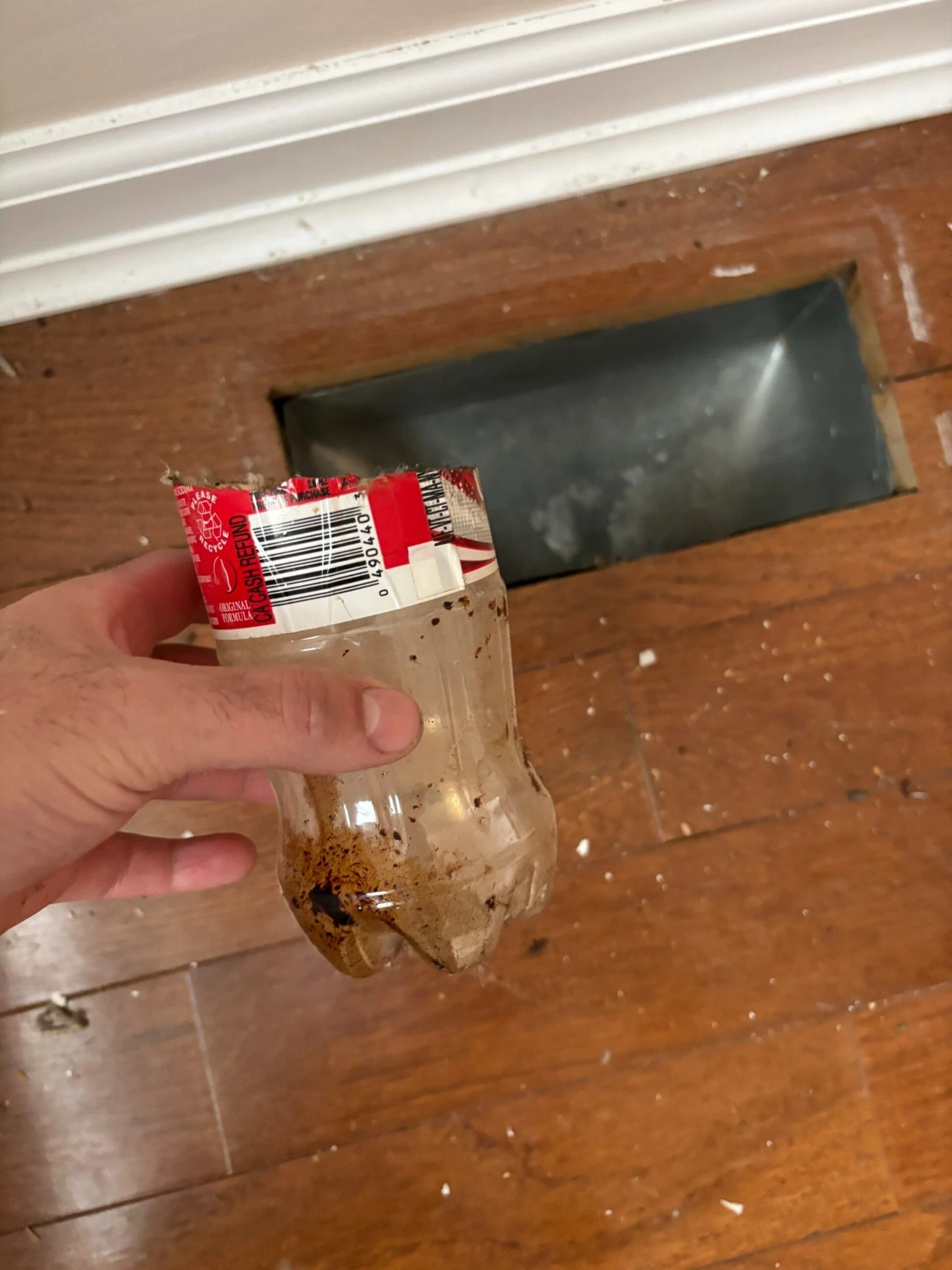 Coke bottle found in a East BrunsWick, NJ air duct.