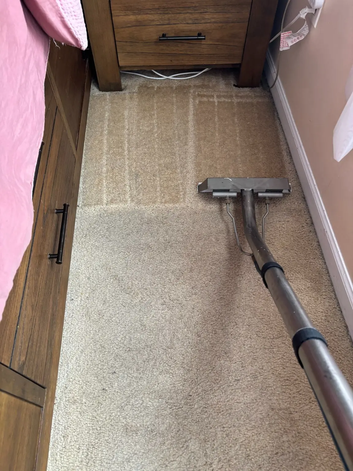 Professional bedroom carpet cleaning in North Brunswick NJ using hot water extraction to remove deep dirt and restore carpet fibers.
