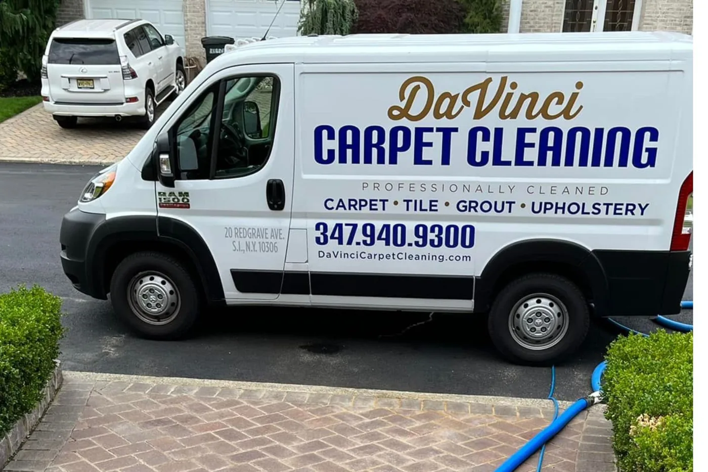 Dryer vent cleaning NJ service van from DaVinci Carpet Cleaning at residential job site.