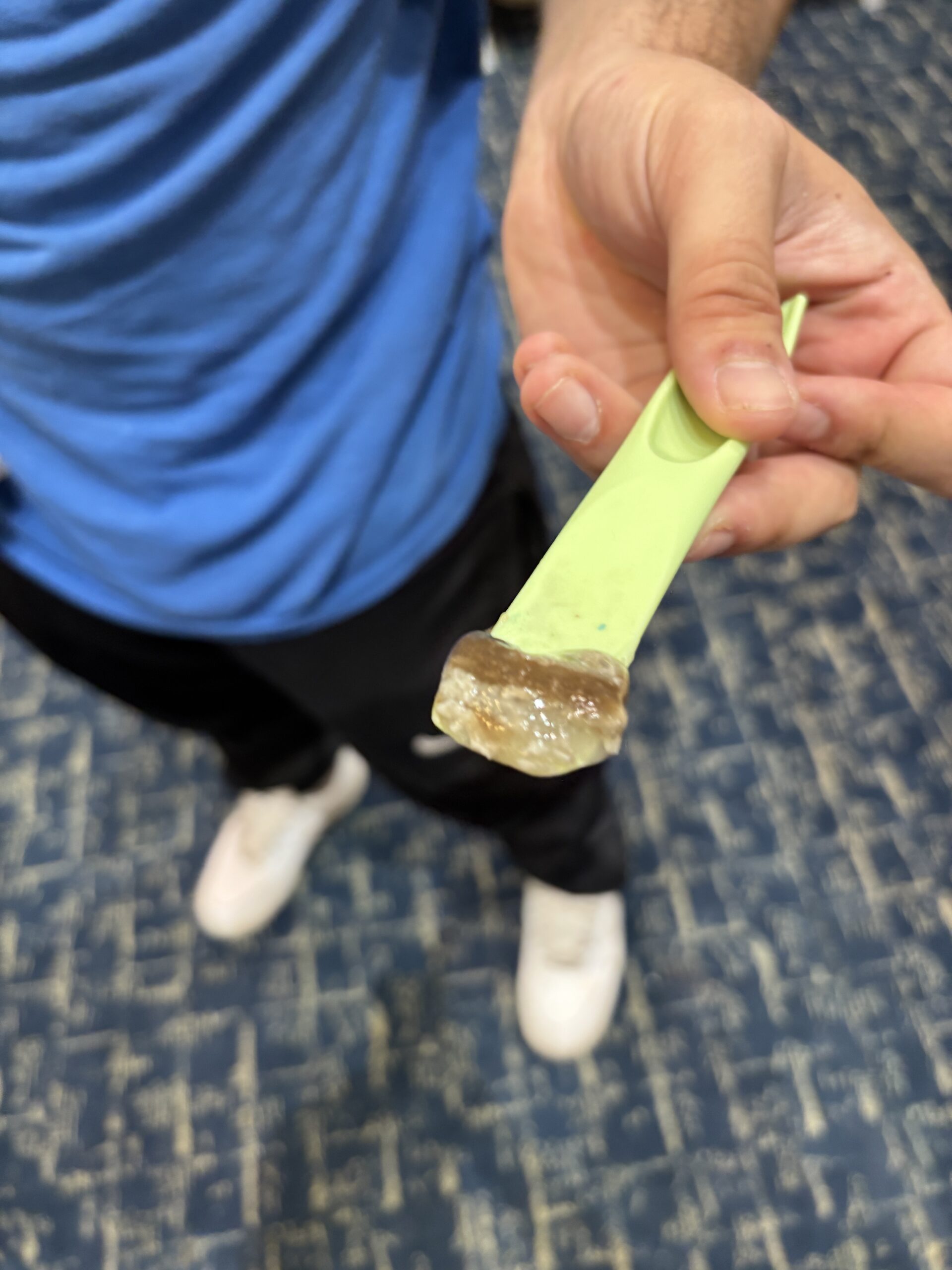 Tar spot removed from carpet, during emergency cleaning in Staten Island, NY.